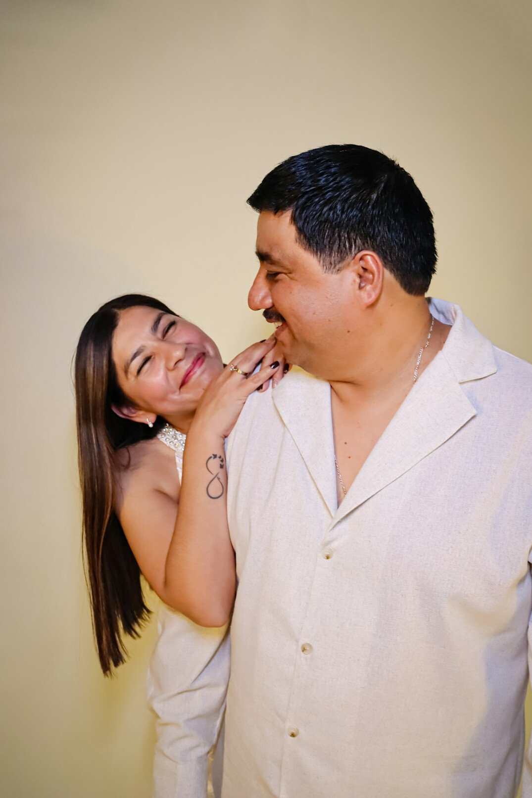 Studio portrait of a Mexican woman finance mentor smiling